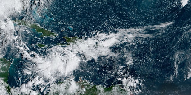 An area of disturbed weahter in the Caribbean in being monitored for development over the next couple of days, according to forecasters.