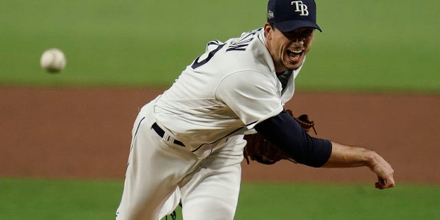 Tampa Bay Rays starting pitcher Charlie Morton throws against the Houston Astros during the sixth inning in Game 7 of a baseball American League Championship Series, Saturday, Oct. 17, 2020, in San Diego. (AP Photo/Gregory Bull)