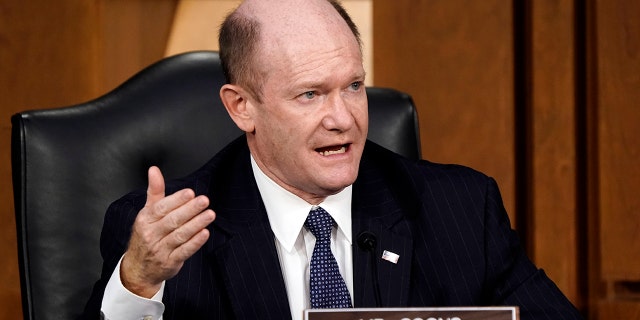 Sen. Chris Coons, D-Del., speaks as the Senate Judiciary Committee hears from legal experts on the final day of the confirmation hearing for Supreme Court nominee Amy Coney Barrett, on Capitol Hill in Washington, Thursday, Oct. 15, 2020. (AP Photo/J. Scott Applewhite)