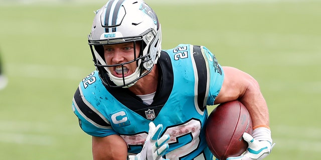 Carolina Panthers running back Christian McCaffrey rushes for a touchdown against the Tampa Bay Buccaneers during a game Sept. 20, 2020, in Tampa, Fla.