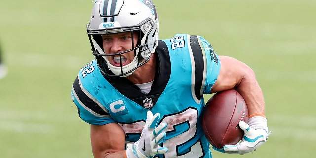 Carolina Panthers running back Christian McCaffrey rushes for a touchdown against the Tampa Bay Buccaneers during a game Sept. 20, 2020, in Tampa, Fla.