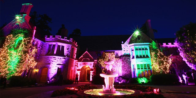 Guests attend the Annual Midsummer Night's Dream Party at the Playboy Mansion hosted by Hugh Hefner on August 16, 2014, in Holmby Hills, California.