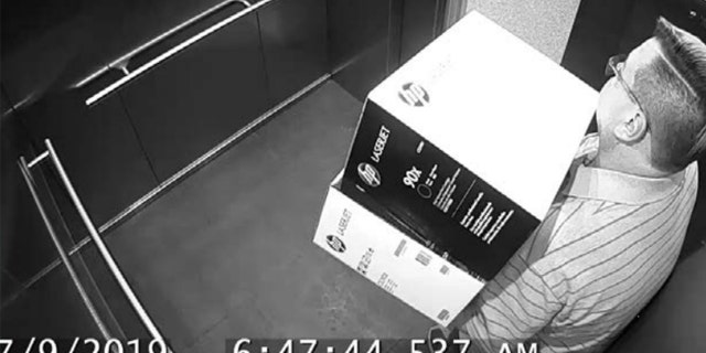 Security camera footage of Randall Whited taking toner boxes from his Austin Public Library worksite was listed as Exhibt One in a City of Austin audit accusing him in the theft of $1.3 million in toner from the library.<br />
“></picture></div>
<div class=
