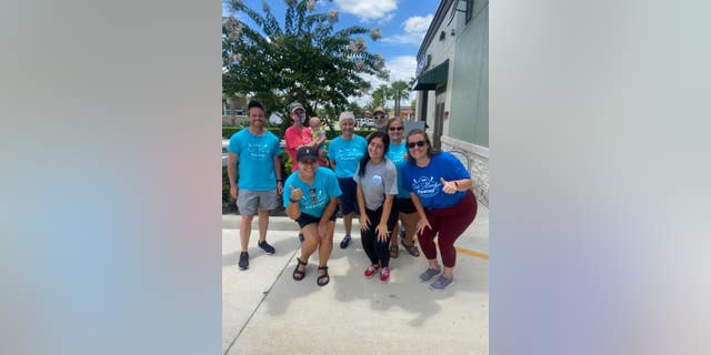 Lartigue (far right), and her team of volunteers working the Cast Member Pantry helping feed furloughed Disney employees. (Courtesy of Lartigue).