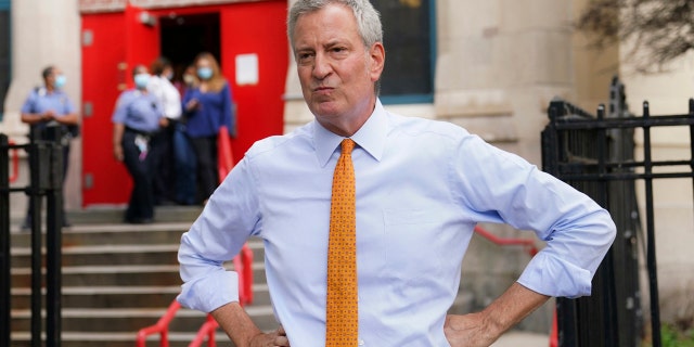 In this Aug. 19, 2020, file photo, New York Mayor Bill de Blasio addresses the media in New York. (AP Photo/John Minchillo, File)
