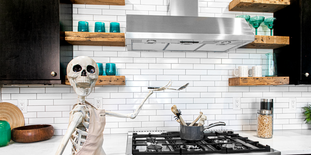 A real estate agent with a funny bone is celebrating the spooky season by decorating homes with skeleton décor.