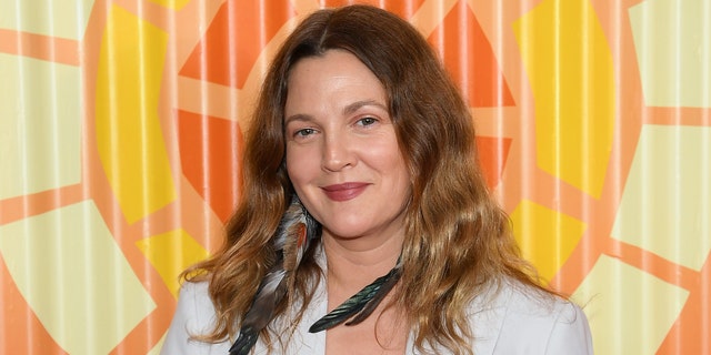 Drew Barrymore is part of the legendary Barrymore family, which included her estranged father, John. She was emancipated from her parents by the age of 14. (Dimitrios Kambouris/Getty Images for The Charlize Theron Africa Outreach Project)