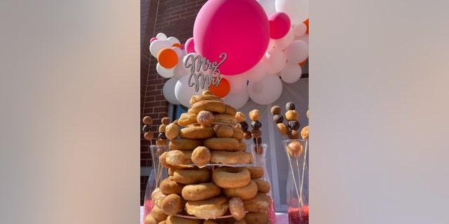 The couple was even provided with a doughnut “bouquet” and doughnut “cake” after Sugar and John exchanged vows.