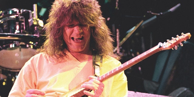 Van Halen guitarist, Eddie Van Halen performing at Cow Palace in San Francisco, Calif. on May 8th 1992. His son, Wolf, confirmed his death Tuesday, calling him 'the best father I could ever ask for.'