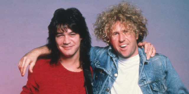 DETROIT - MAY 9:  (L-R) Dutch-American lead guitarist and songwriter Eddie Van Halen and American rock vocalist, songwriter and entrepreneur Sammy Hagar, of the hard rock band Van Halen, backstage during their "5150" tour, on May 9, 1986, at the Joe Louis Arena in Detroit, Michigan.  (Photo by Ross Marino/Getty Images)