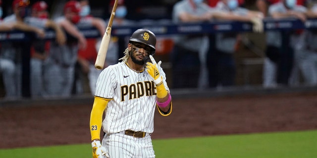 San Diego Padres' Fernando Tatis Jr. tosses his bat after hitting a two-run home run during the seventh inning of Game 2 of the team's National League wild-card baseball series against the St. Louis Cardinals, Thursday, Oct. 1, 2020, in San Diego. (AP Photo/Gregory Bull)