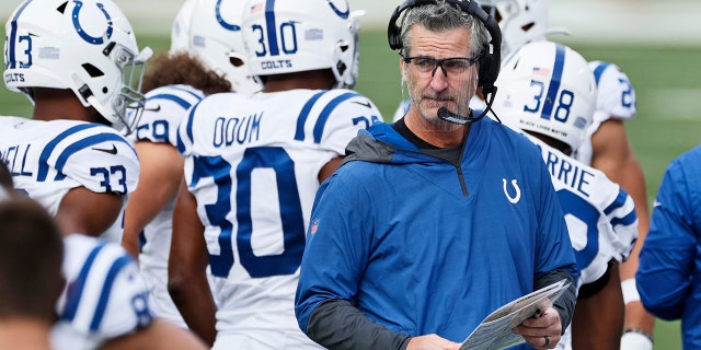 Indianapolis Colts head coach Frank Reich keeps watch during the Browns game, Sunday, Oct. 11, 2020, in Cleveland. (AP Photo/Ron Schwane)