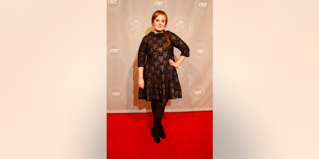 Adele taking a spin at country music. She performed with Darius Rucker at the 2010 CMT Artists of the Year.