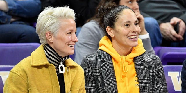 USWNT forward Megan Rapinoe, left and Seattle Storm defender Sue Bird join a game at the Alaska Airlines Arena on January 27, 2019 in Seattle, Washington. (Beautiful pictures)