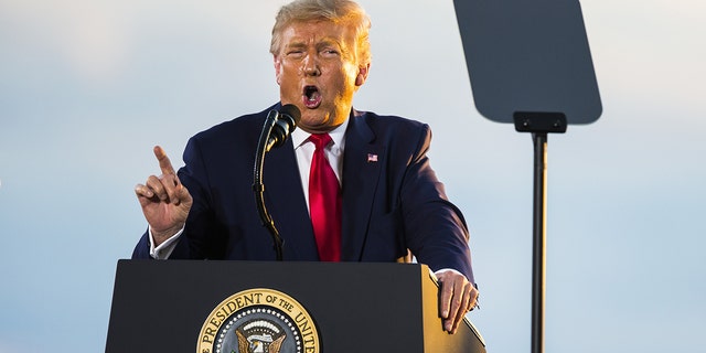 U.S. President Donald Trump speaks during a campaign rally at the Pro Star Aviation hangar in Londonderry, New Hampshire, U.S., on Friday, Aug. 28, 2020. Photographer: Adam Glanzman via Getty Images