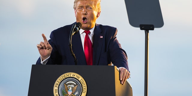 US President Donald Trump speaks during a campaign rally at the Pro Star Aviation hangar in Londonderry, New Hampshire, US, Friday, August 28, 2020. Photographer: Adam Glanzman/Bloomberg via Getty Images