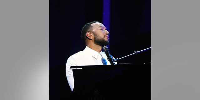 John Legend performs onstage at the 2020 Billboard Music Awards. (Photo by Kevin Winter/BBMA2020/Getty Images for dcp)