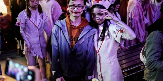 People dressed in Halloween-themed costumes participate in a parade event celebrating Halloween at the Happy Valley on October 29, 2020, in Wuhan, Hubei province, China. (Photo by Getty Images)