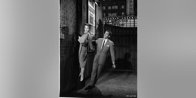 Marge Champion and Gower Champion performing a dance number in a scene from the 1955 film 'Three For The Show.' The pair was married from 1947 to 1973. (Photo by Columbia Pictures/Getty Images)