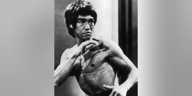 Chinese-American martial arts exponent Bruce Lee (1940 - 1973), in a still from the film 'Enter The Dragon', directed by Robert Crouse for Warner Brothers, 1973.