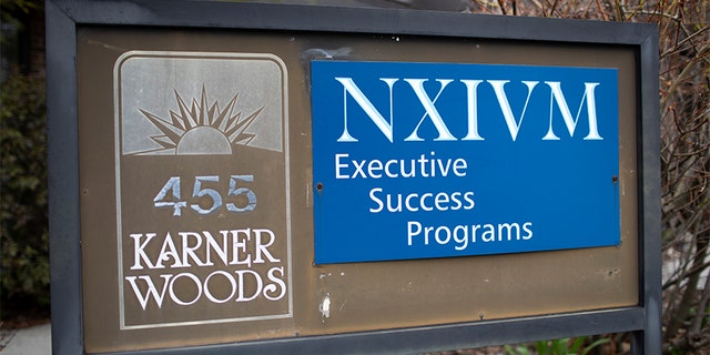 The NXIVM Executive Success Programs sign outside of the office at 455 New Karner Road on April 26, 2018 in Albany, New York. Keith Raniere, founder of NXIVM, was arrested by the FBI in Mexico in March of 2018.