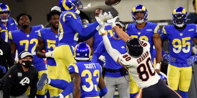 Los Angeles Rams cornerback Jalen Ramsey, left, intercepts a pass intended for Chicago Bears tight end Jimmy Graham (80) during the second half of an NFL football game Monday, Oct. 26, 2020, in Inglewood, Calif. (AP Photo/Kelvin Kuo)