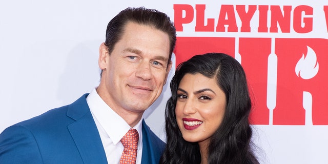 John Cena (left) and Shay Shariatzadeh married in Florida this week. (Photo by Noam Galai/Getty Images)