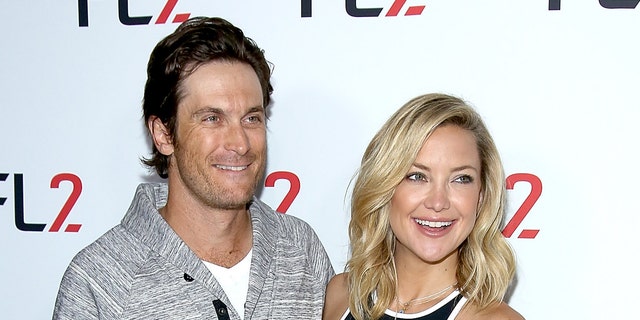 Oliver Hudson (left) and Kate Hudson (right) have a strained relationship with their father, Bill. Their stepfather is actor Kurt Russell. (Paul Zimmerman/WireImage)