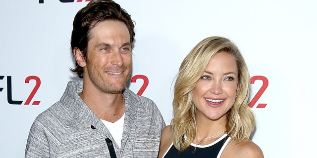 Oliver Hudson (left) and Kate Hudson (right) have a strained relationship with their father, Bill. Their stepfather is actor Kurt Russell. (Paul Zimmerman/WireImage)