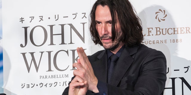 Keanu Reeves, the star of the "John Wick" film franchise, is seen at the third film's premiere in Tokyo. A ride based on the movies is currently slated to open in Dubai in 2021.?