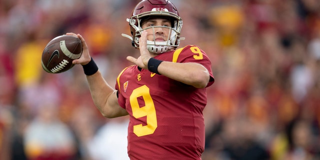 In this Nov. 2, 2019 file photo, Southern California quarterback Kedon Slovis throws a pass during the first half of an NCAA college football game against Oregon in Los Angeles. (AP Photo/Kyusung Gong, File)
