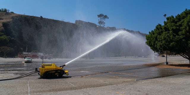 The Los Angeles Fire Department debuted the first robotic firefighting vehicle in the United States, putting it to use on its first day in service Tuesday.