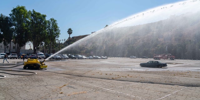 The Los Angeles Fire Department debuted the first robotic firefighting vehicle in the United States, putting it to use on its first day in service Tuesday.