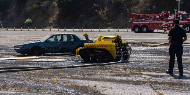 The Los Angeles Fire Department debuted the first robotic firefighting vehicle in the United States, putting it to use on its first day in service Tuesday.