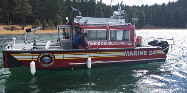 A woman drowned in Lake Tahoe late Friday and 6 children were rescued from a boat that drifted away after their father jumped in to help.