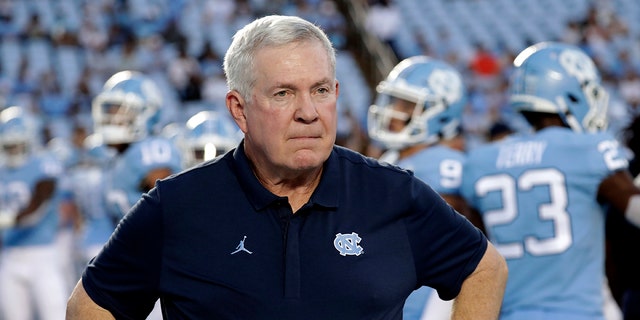 North Carolina head coach Mack Brown looks on before an NCAA college football game against Miami in Chapel Hill, N.C., Saturday, Sept. 7, 2019. The last time North Carolina went this long between games during a football season was 1952 when a polio outbreak on campus forced the Tar Heels to cancel two games. (AP Photo/Chris Seward, File)