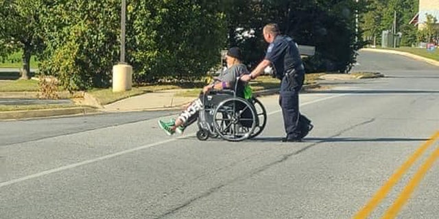 Cpl. Gray Maloy spotted someone in a wheelchair who wanted to cross a road in Mechanicsville on Oct. 5, and stopped traffic to help the man cross the street.