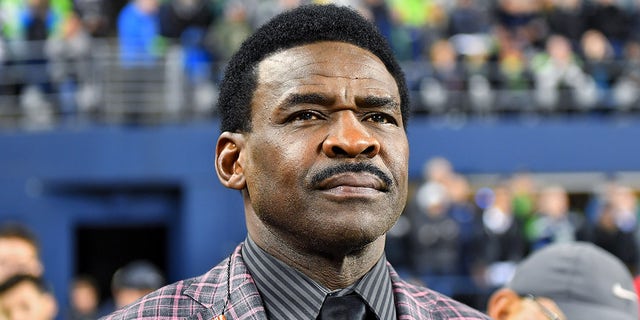 Dallas Cowboys Hall of Fame wide receiver Michael Irvin watches the game against the Seattle Seahawks and Los Angeles Rams at CenturyLink Field on October 3, 2019 in Seattle.