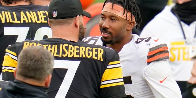 Pittsburgh Steelers quarterback Ben Roethlisberger (7) and Cleveland Browns defensive end Myles Garrett (95) meet on the field following an NFL football game in Pittsburgh, Sunday, Oct. 18, 2020. (AP Photo/Gene J. Puskar)
