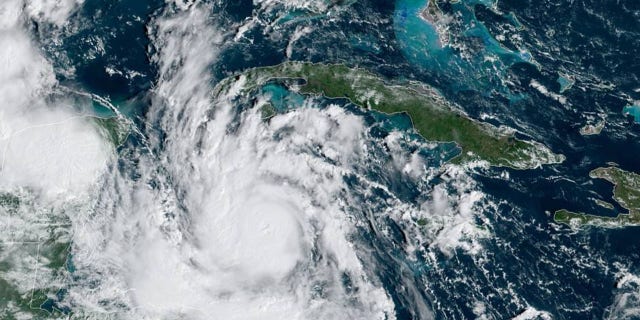 Hurricane Delta, strengthening as it takes aim at Mexico's Yucatan Peninsula, can be seen on satellite Oct. 6, 2020.