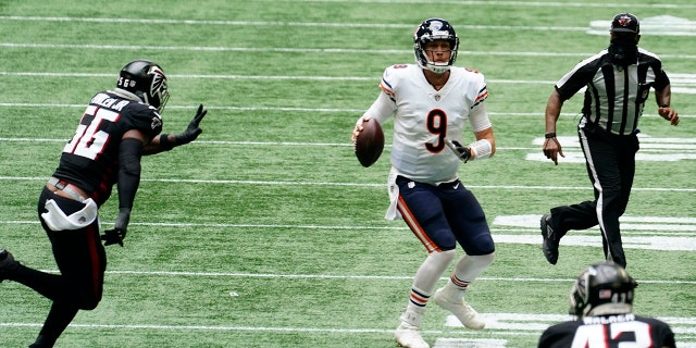 Chicago Bears quarterback Nick Foles (9) works against the Atlanta Falcons during the second half of an NFL football game, Sunday, Sept. 27, 2020, in Atlanta. (AP Photo/Brynn Anderson)