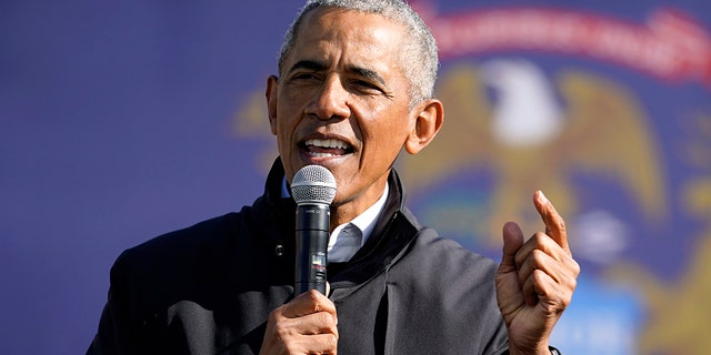 Former President Obama speaks at a rally for Democratic presidential candidate Joe Biden in Flint, Michigan, on Oct. 31, 2020.