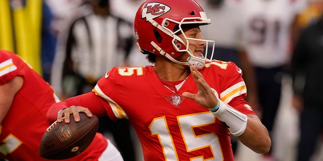 Kansas City Chiefs quarterback Patrick Mahomes throws a pass during the first half of an NFL football game against the New England Patriots, Monday, Oct. 5, 2020, in Kansas City. (AP Photo/Charlie Riedel)