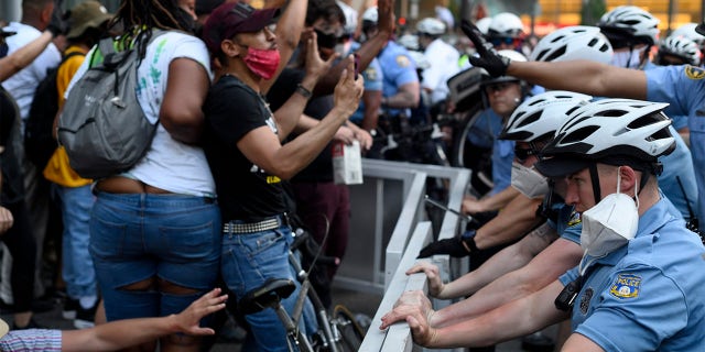 Police officers and protestors clash in Center City Philadelphia, PA on May 30. (Photo by Bastiaan Slabbers/NurPhoto via Getty Images)