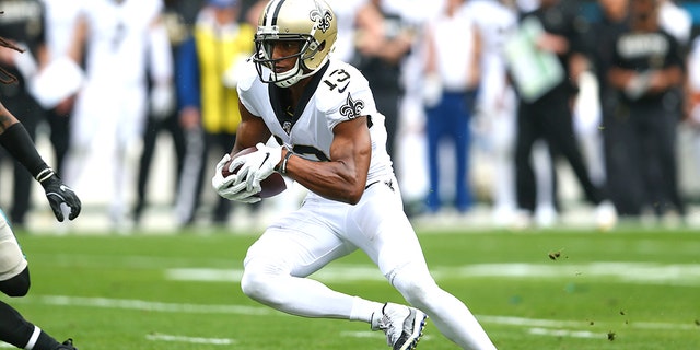 Dec 29, 2019; Charlotte, North Carolina, USA; New Orleans Saints wide receiver Michael Thomas (13) runs after a reception in the first quarter against the Carolina Panthers at Bank of America Stadium.