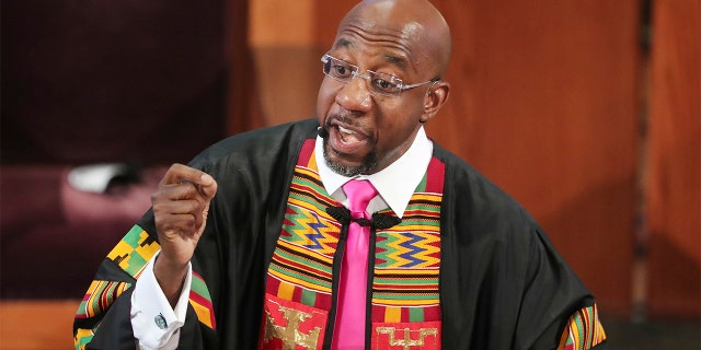 In this June 23, 2020, file photo, Rev. Raphael G. Warnock delivers the eulogy for Rayshard Brooks' funeral at Ebenezer Baptist Church in Atlanta. (Curtis Compton/Atlanta Journal-Constitution via AP, Pool)
