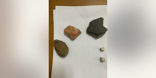 Included among the items Nicole returned were two mosaic tiles, two fragments of amphora jugs and a piece of a wall.