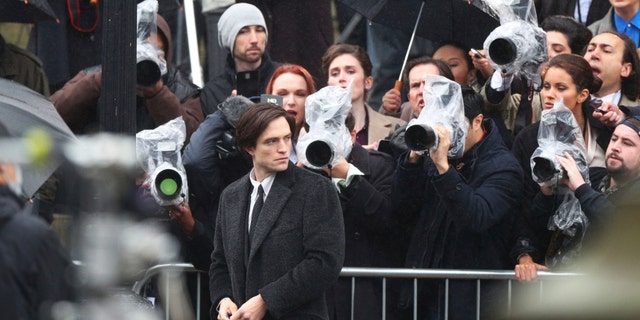 Actor Robert Pattinson during filming of 'The Batman' outside St George's Hall in Liverpool, Monday Oct. 12, 2020. (Peter Byrne/PA via AP)