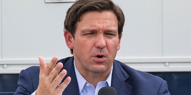 Florida Gov. Ron DeSantis scolded CNN reporter Rosa Flores on Monday for implying that Florida has experienced issues distributing the coronavirus vaccine. (Diaz/Pool via REUTERS)