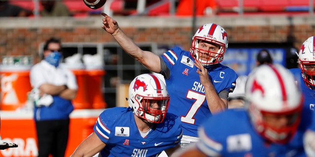 SMU quarterback Shane Buechele (7) throws a pass during the second half of an NCAA college football game against Memphis in Dallas, Saturday, Oct. 3, 2020. (AP Photo/Roger Steinman)